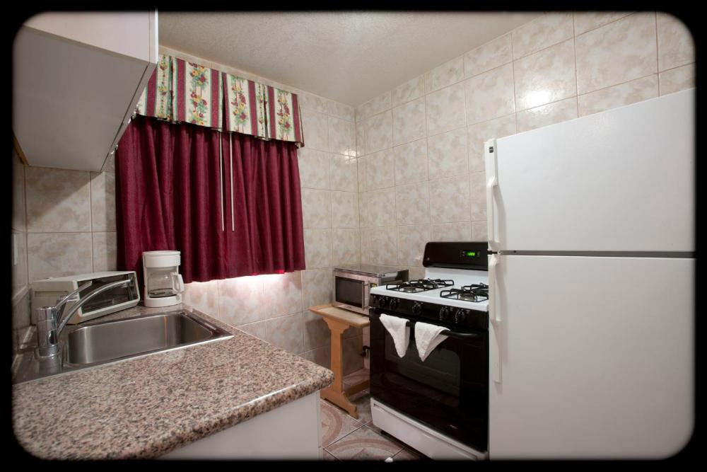 Deluxe Double Room with Two Double Beds and Kitchen interior